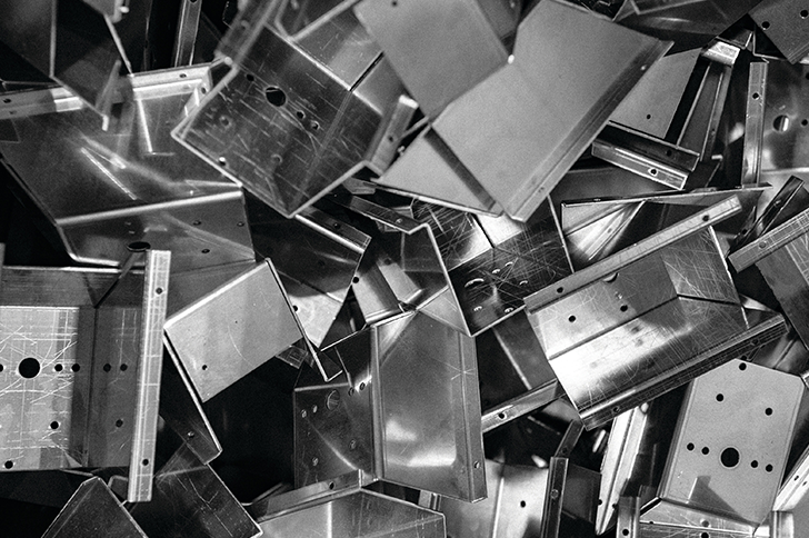 a pile of recycled stainless steel as raw materials of Sub-Zero and Wolf's products 
